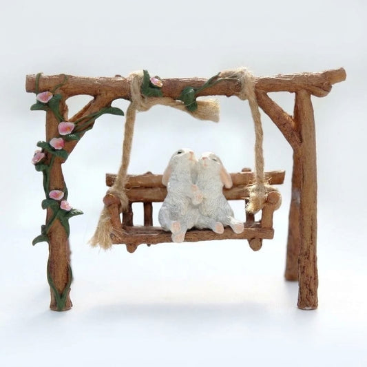 Fairy Garden Miniature Sweetheart Bunnies on a Floral Rustic Garden Swing – detail view
