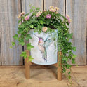 Watercolor Hummingbird Metal Planter on Elevated Wooden Plant Stand